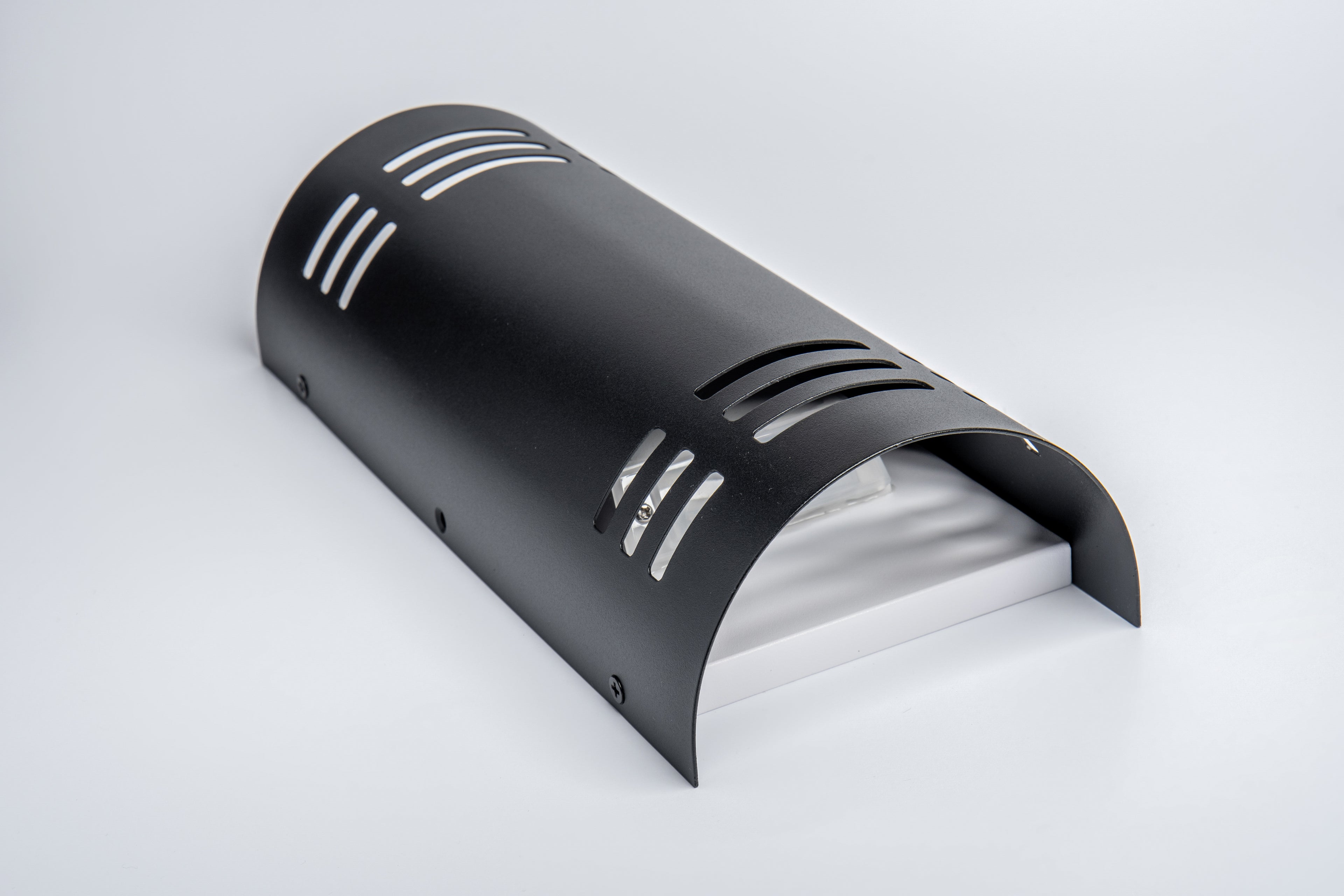 Black outdoor wall light fixture on a white background